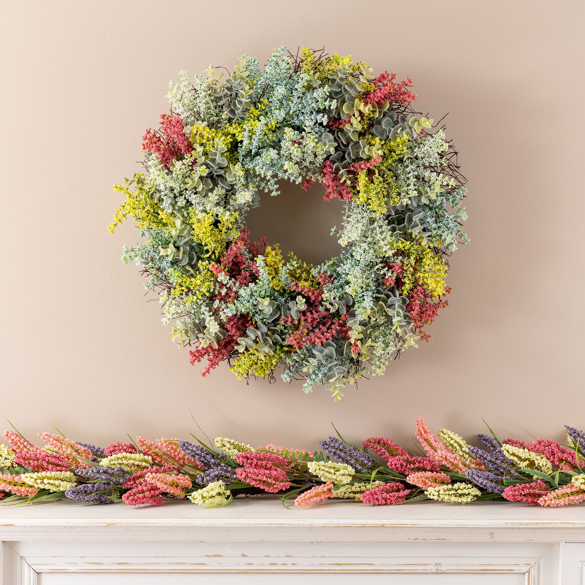 Glitzhome® 24" Mixed Floral Eucalyptus Wreath with Black Metal Hanger